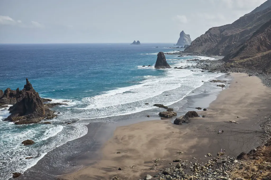 Black-sand beach and volcanic sea stacks on the north coast of Tenerife.